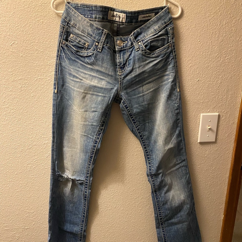 Day trip lynx bootcut jeans, size 26XL, light wash,pre-ripped hole in right knee